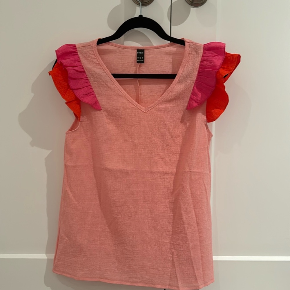 Never worn pink and fuchsia blouse